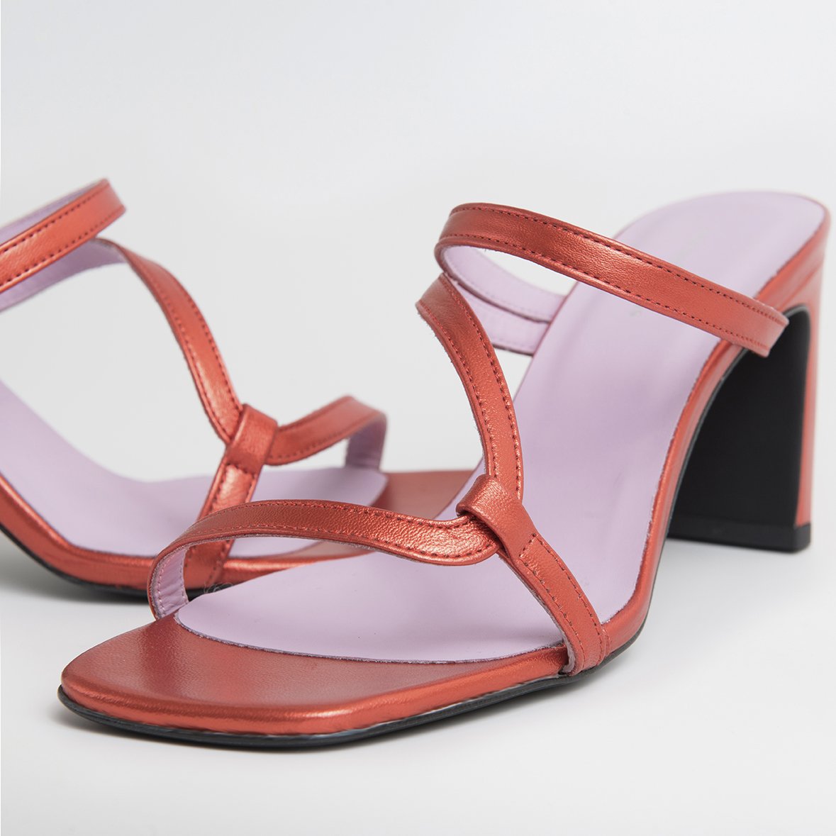 LILY Orange shoes featuring metallic leather upper, thin straps, and square cut toes, handcrafted in Portugal.